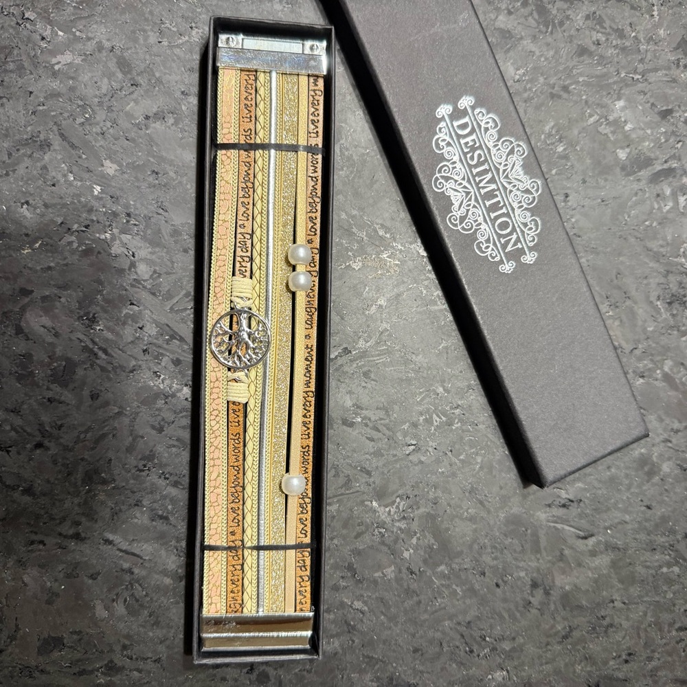New in box multi strand leather bracelet with magnetic clasp